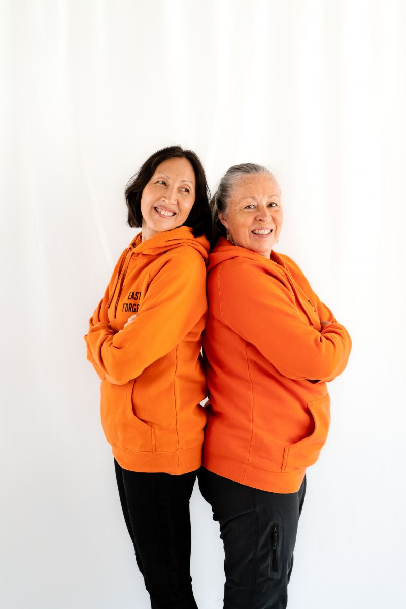 Image of two women standing side-by-side