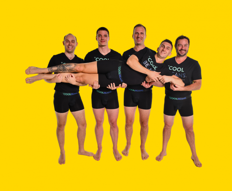 Photo of a group of men wearing Cool Beans black trunks.