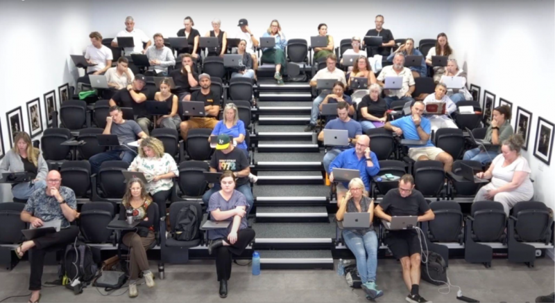Photo of a crowd in an auditorium