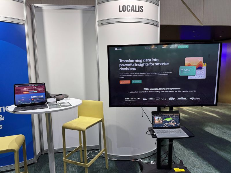 A computer screen, and TV screen showcasing data.  