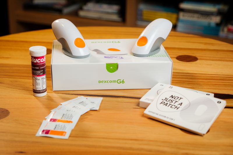 Image of a box and of diabetes monitoring equipment content © Stripped Supply